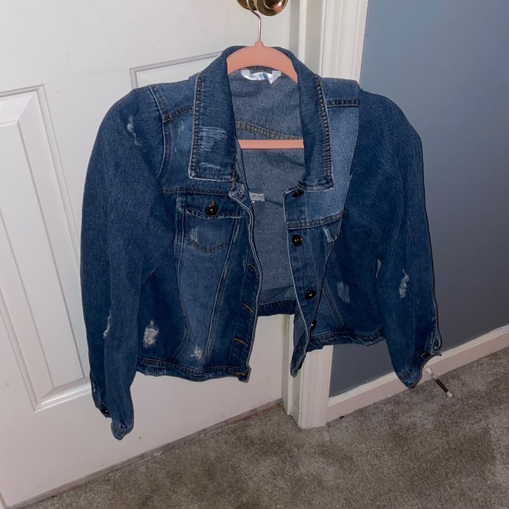 Xl Jean jacket with rips